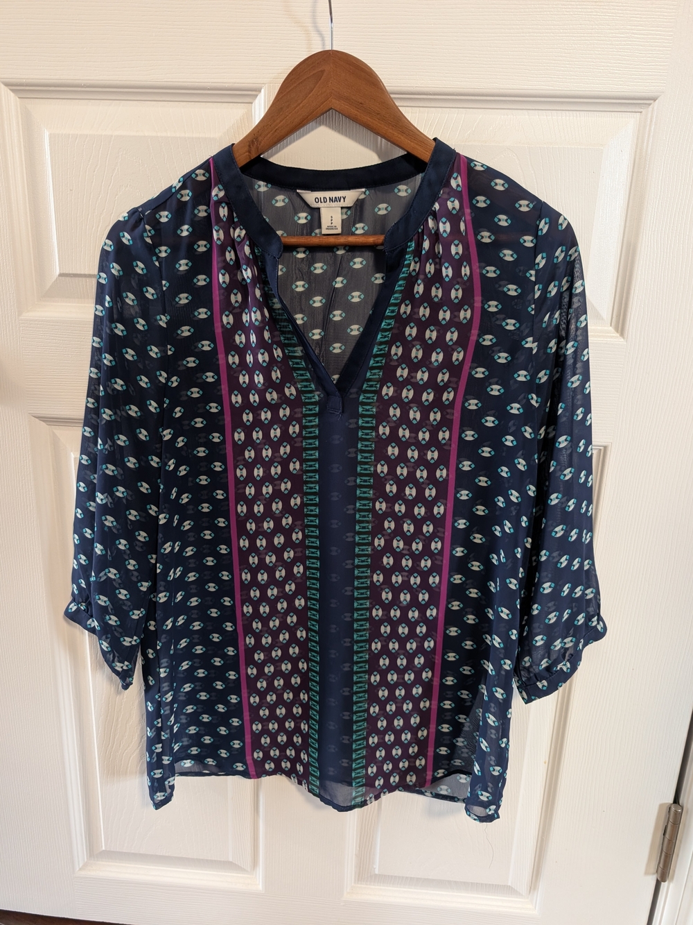 Navy Blue Patterned V-Neck Blouse with Teal and Purple Accents